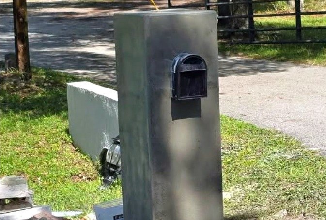 Custom concrete mailbox column viewed from the front