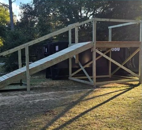 Side view of a long wooden access ramp